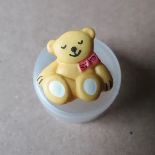 Knopf Kunststoff Bär gelb - 19 mm