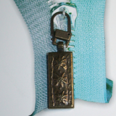 Zipper Pull Edelweiß antique brass