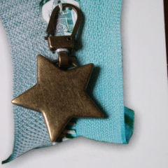 Zipper Pull Star antique brass