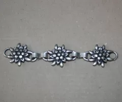 Applikation mit drei Edelweiss - Metall
