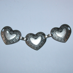 Applikation mit drei Herzen - Metall